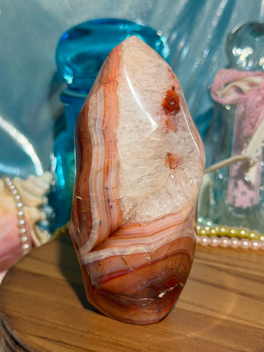 Large pink banded carnelian flame with quartz
