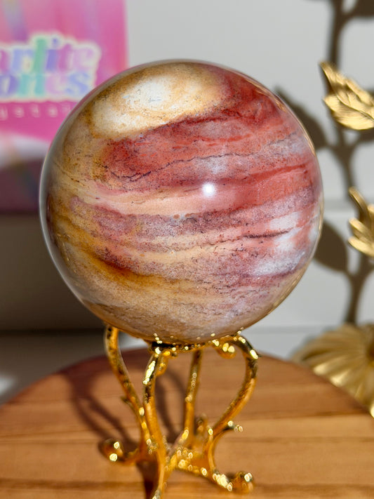 Warm toned red and yellow sea jasper sphere