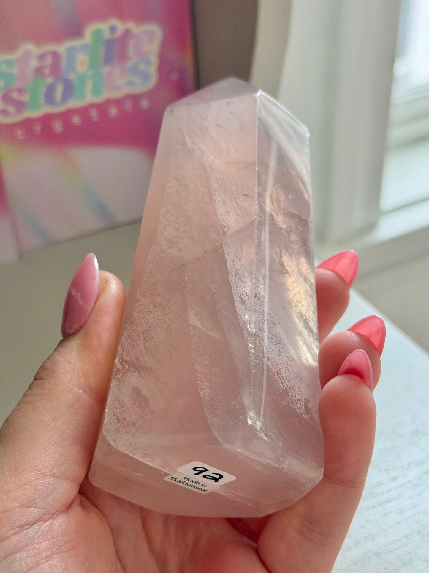 Glassy pink rose quartz tower