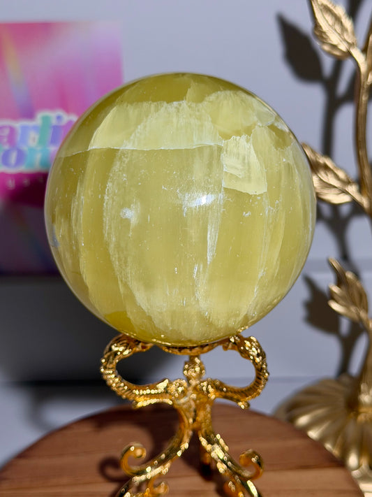 Lemon calcite sphere from Pakistan with rainbows