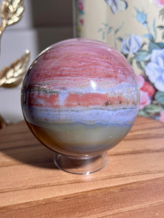Pink rainbow sea jasper sphere
