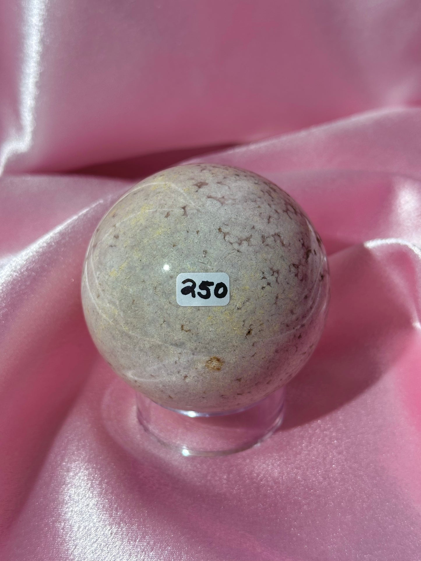 Pink pastel flower agate sphere from Madagascar with bubby druzy