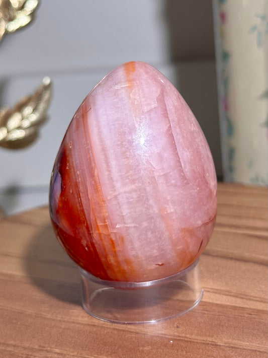 Pink glowy carnelian egg