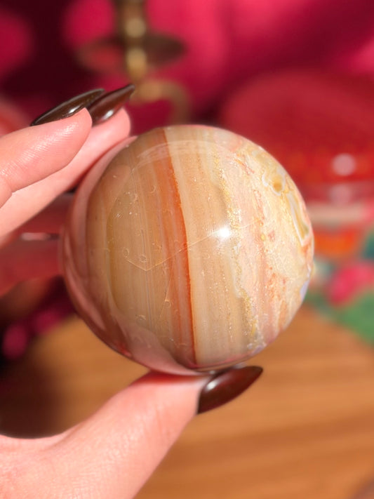 Warm toned polychrome jasper sphere
