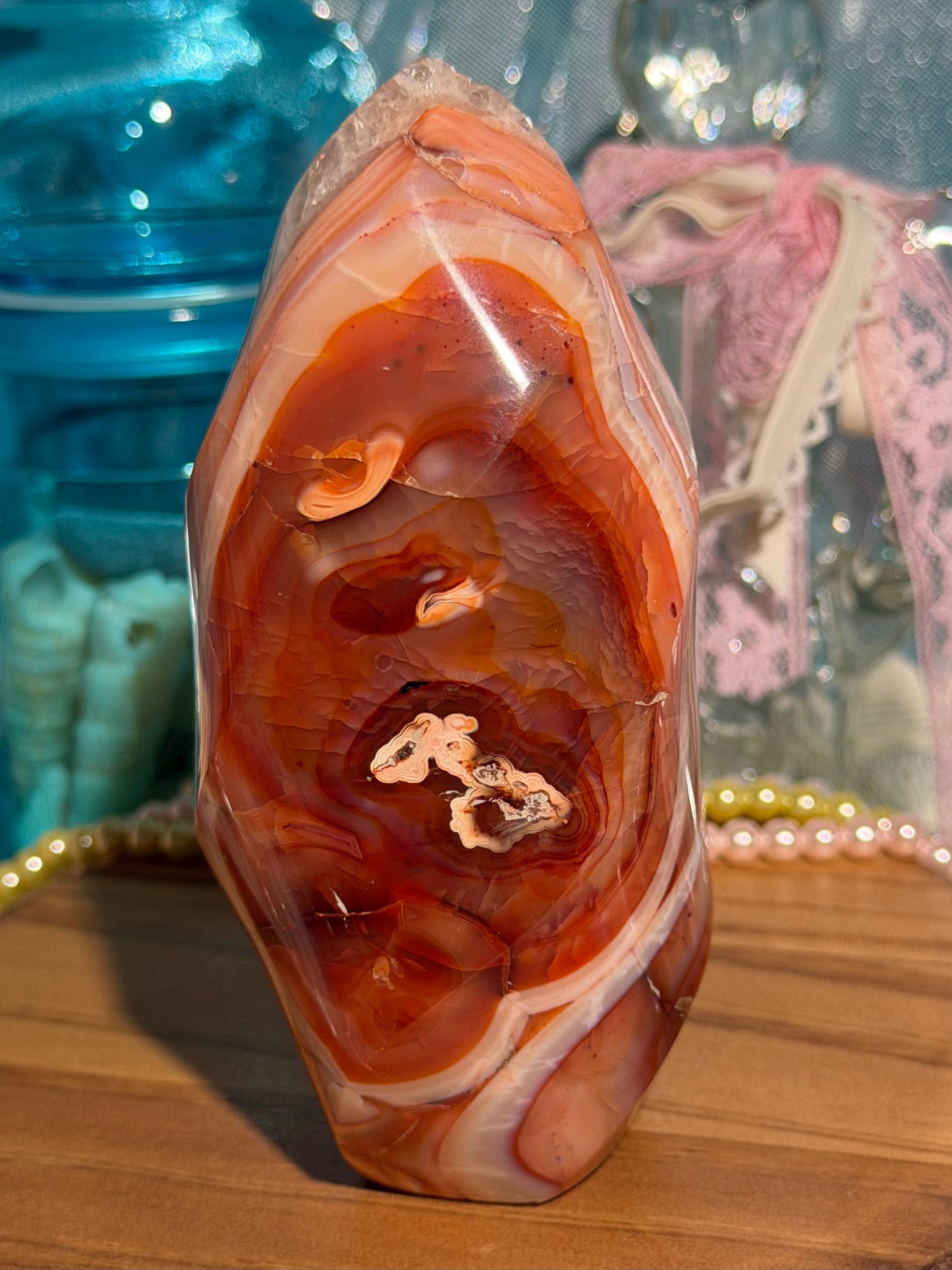 Large pink banded carnelian flame with quartz