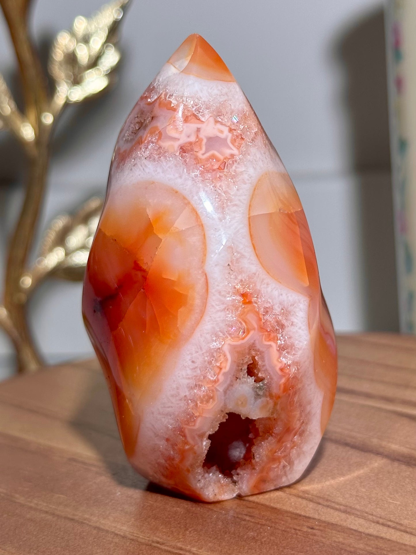 Peachy carnelian flame with quartz and natural caves