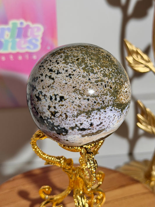 Moody black and green orbicular sea jasper sphere