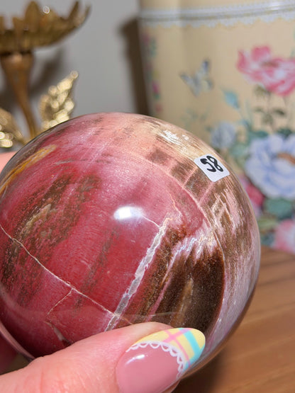 Pink petrified wood sphere *imperfect