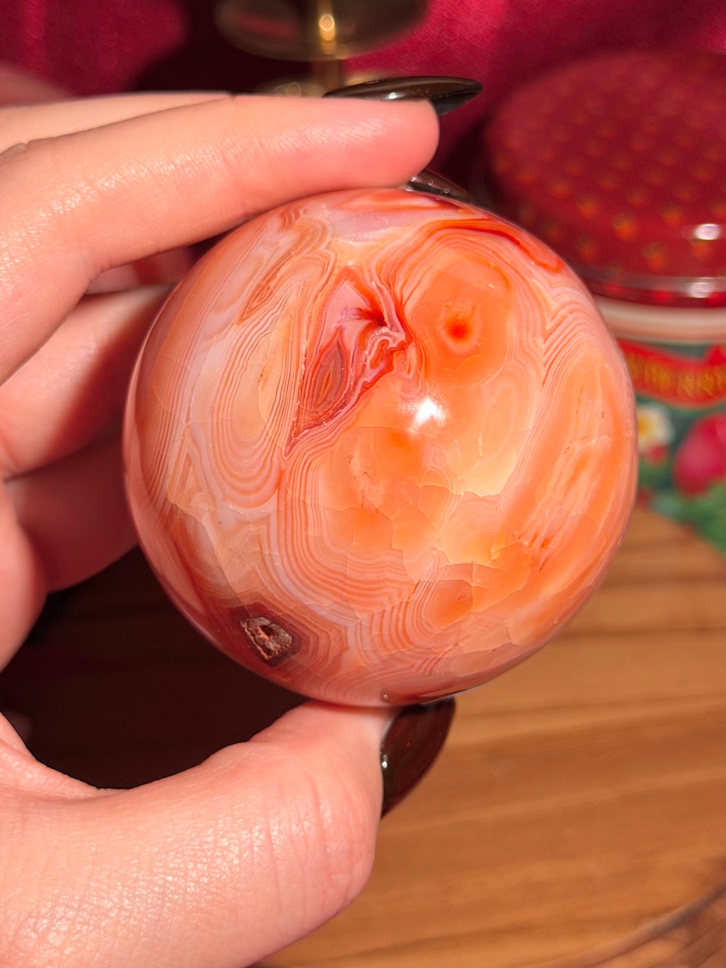 Peachy pink carnelian sphere with adorable scalloped banding