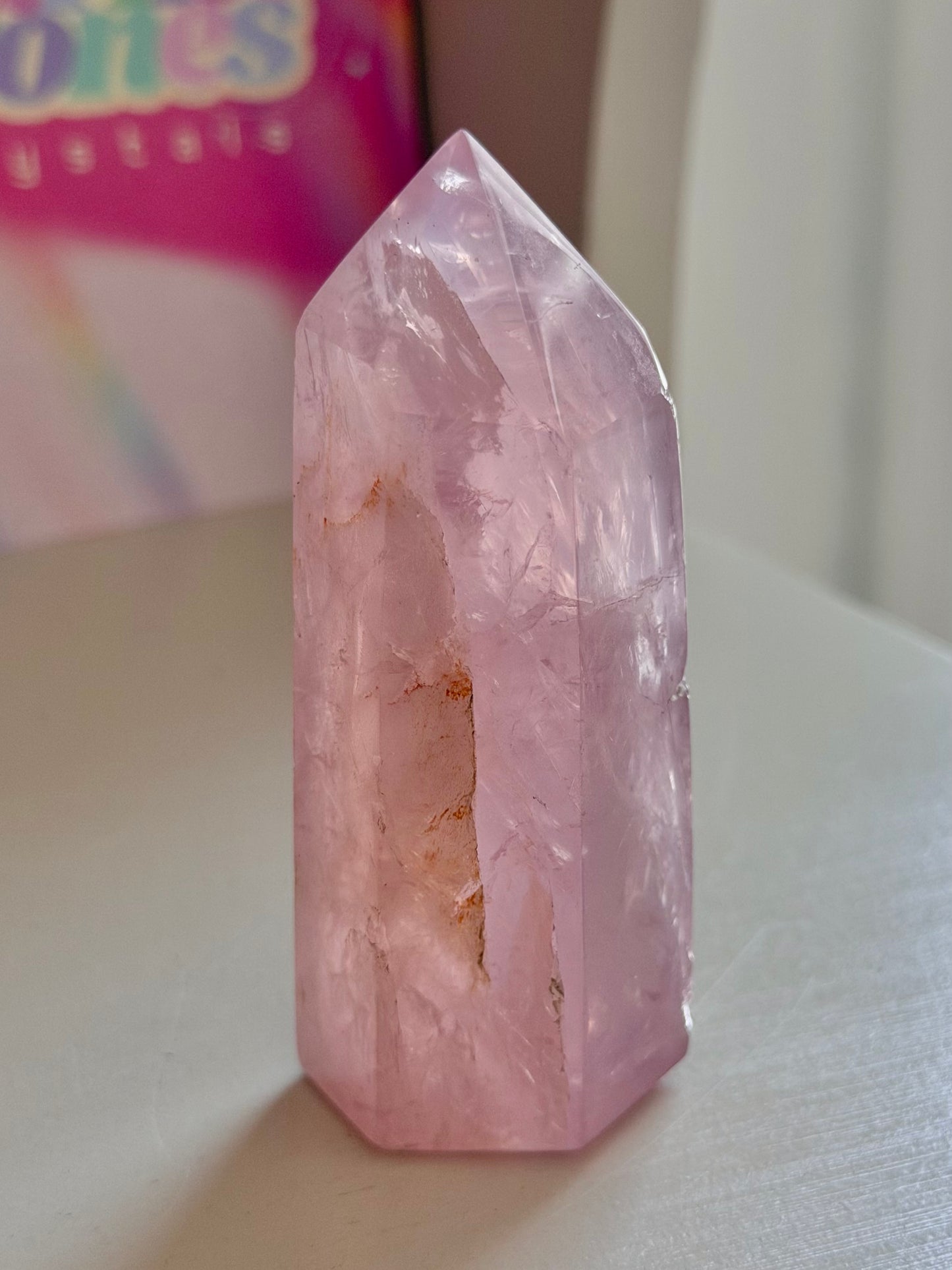 Gemmy purple-toned rose quartz tower
