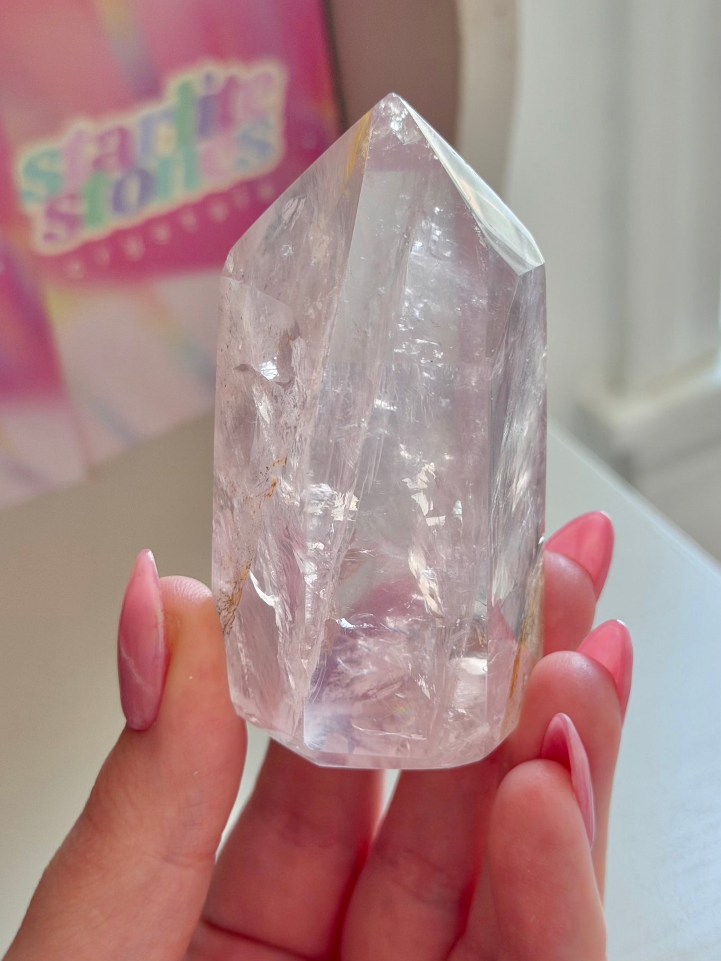 Icy rose quartz tower with dendrites