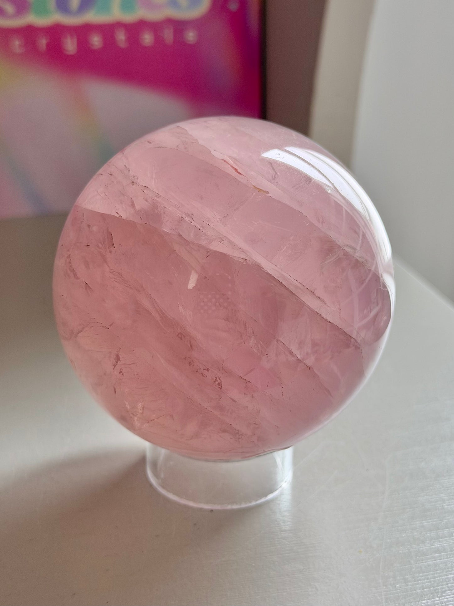 Pink gemmy star rose quartz sphere