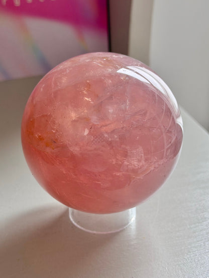 Juicy pink star rose quartz sphere with rainbows
