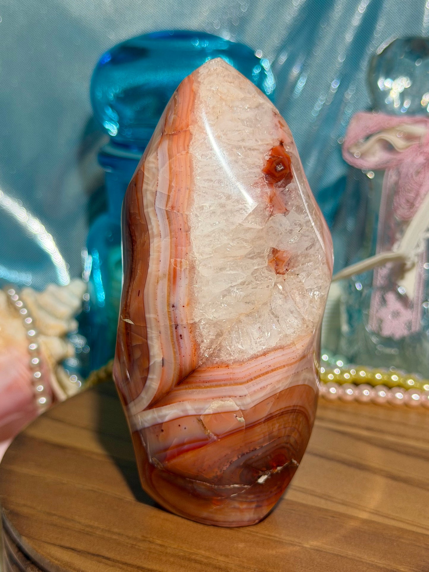 Large pink banded carnelian flame with quartz