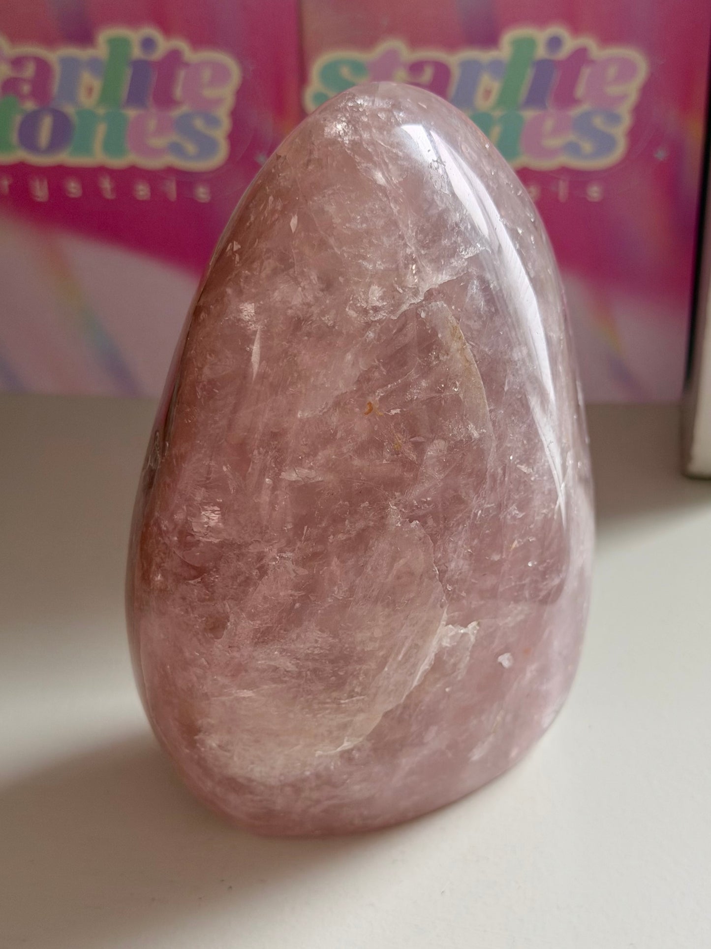 Rainbow filled purple-toned star rose quartz freeform