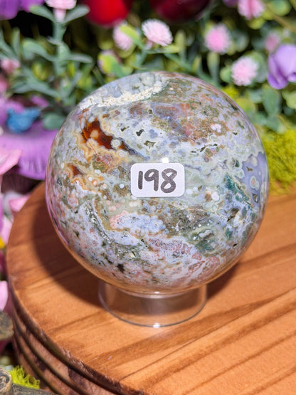 Green and pink 8th Vein Ocean Jasper sphere