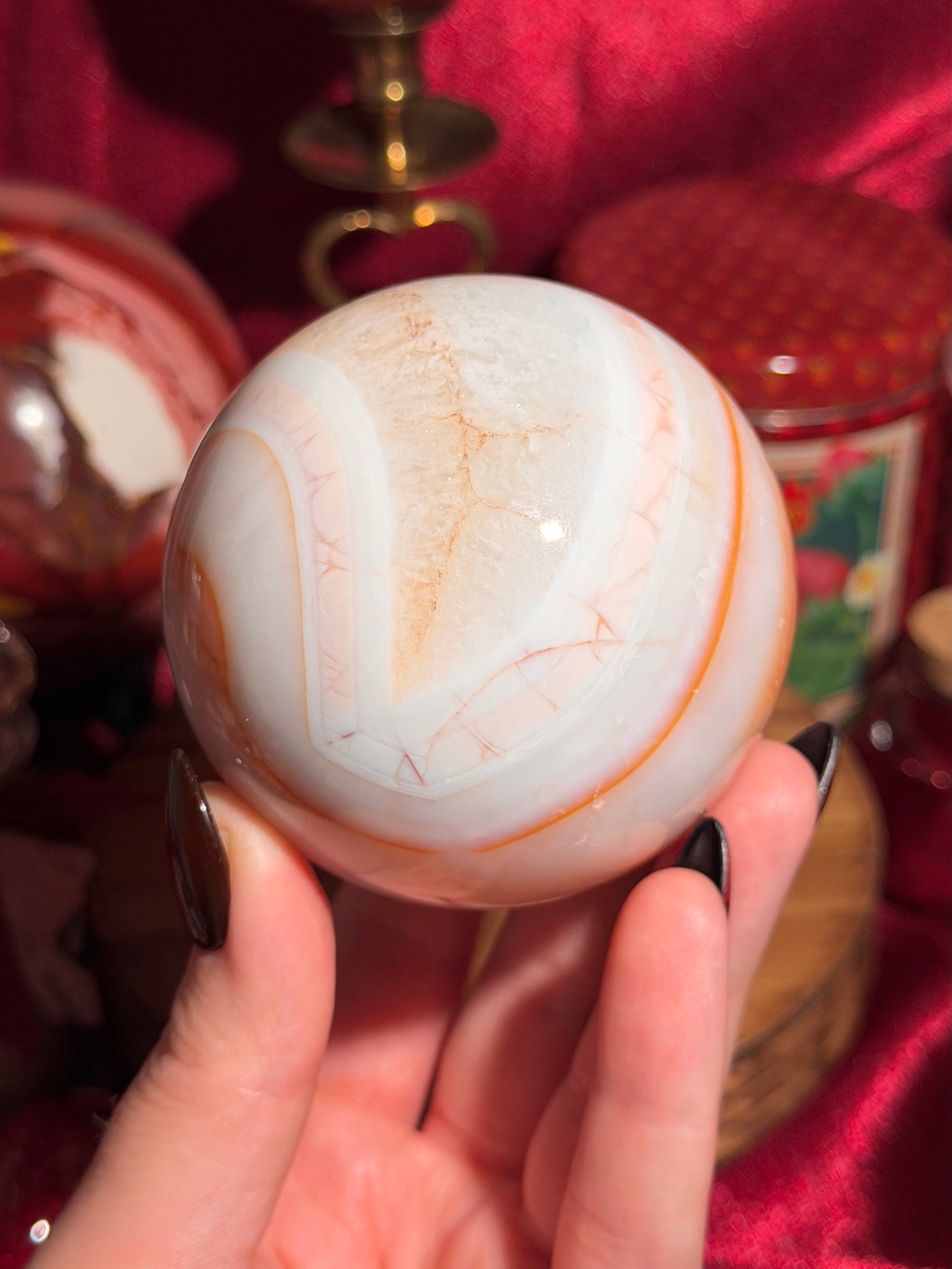 Pastel cool toned pink carnelian sphere with quartz 75mm
