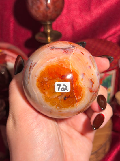 Pastel yellow and peachy toned carnelian sphere with large druzy cave 72mm