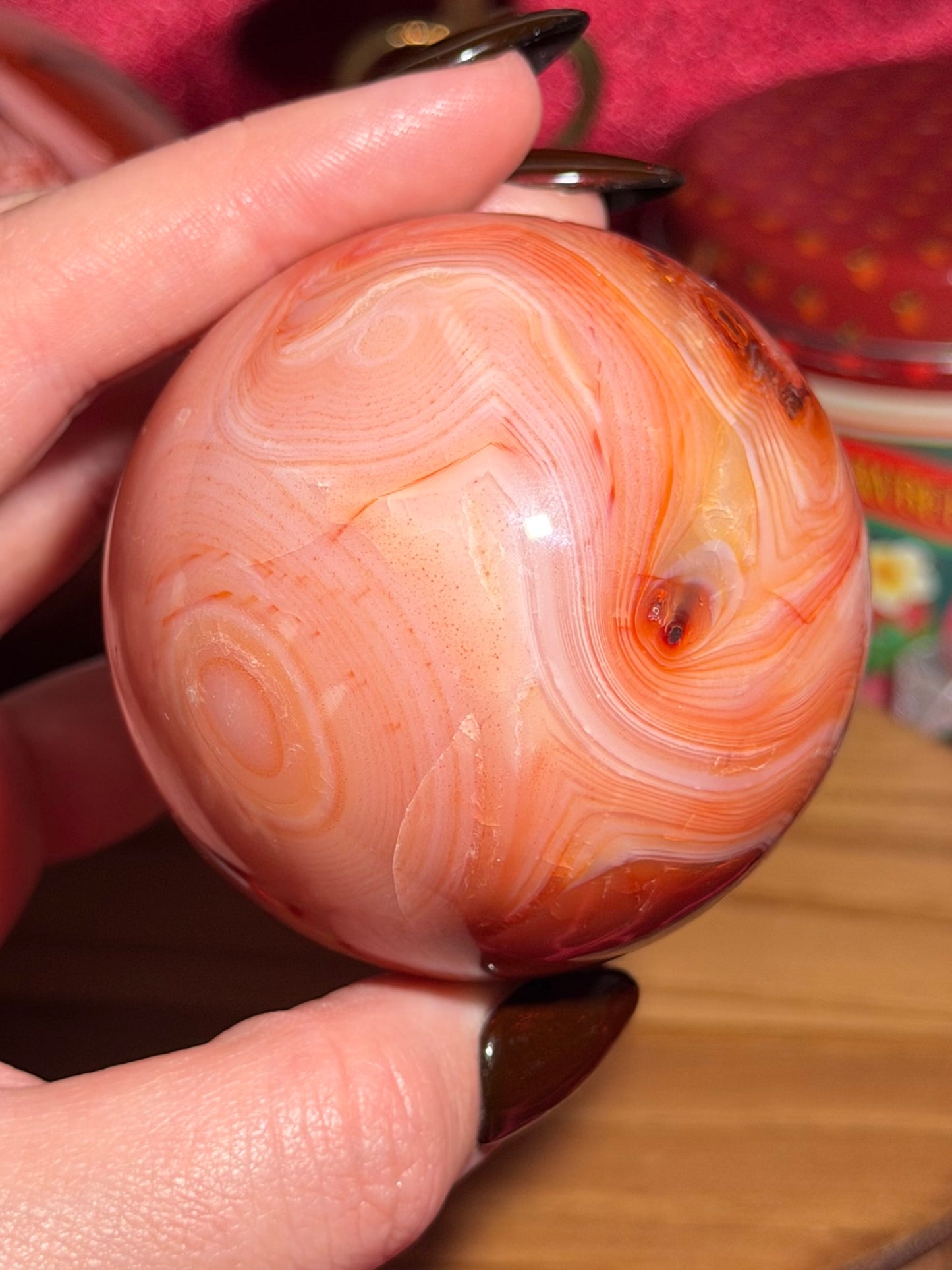 Pink banded carnelian sphere