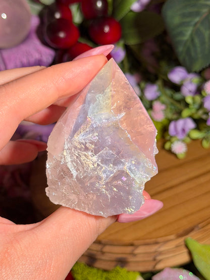 Aura coated rose quartz half polished point from Brazil