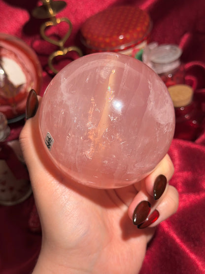 High quality star rose quartz sphere with golden glittery flash