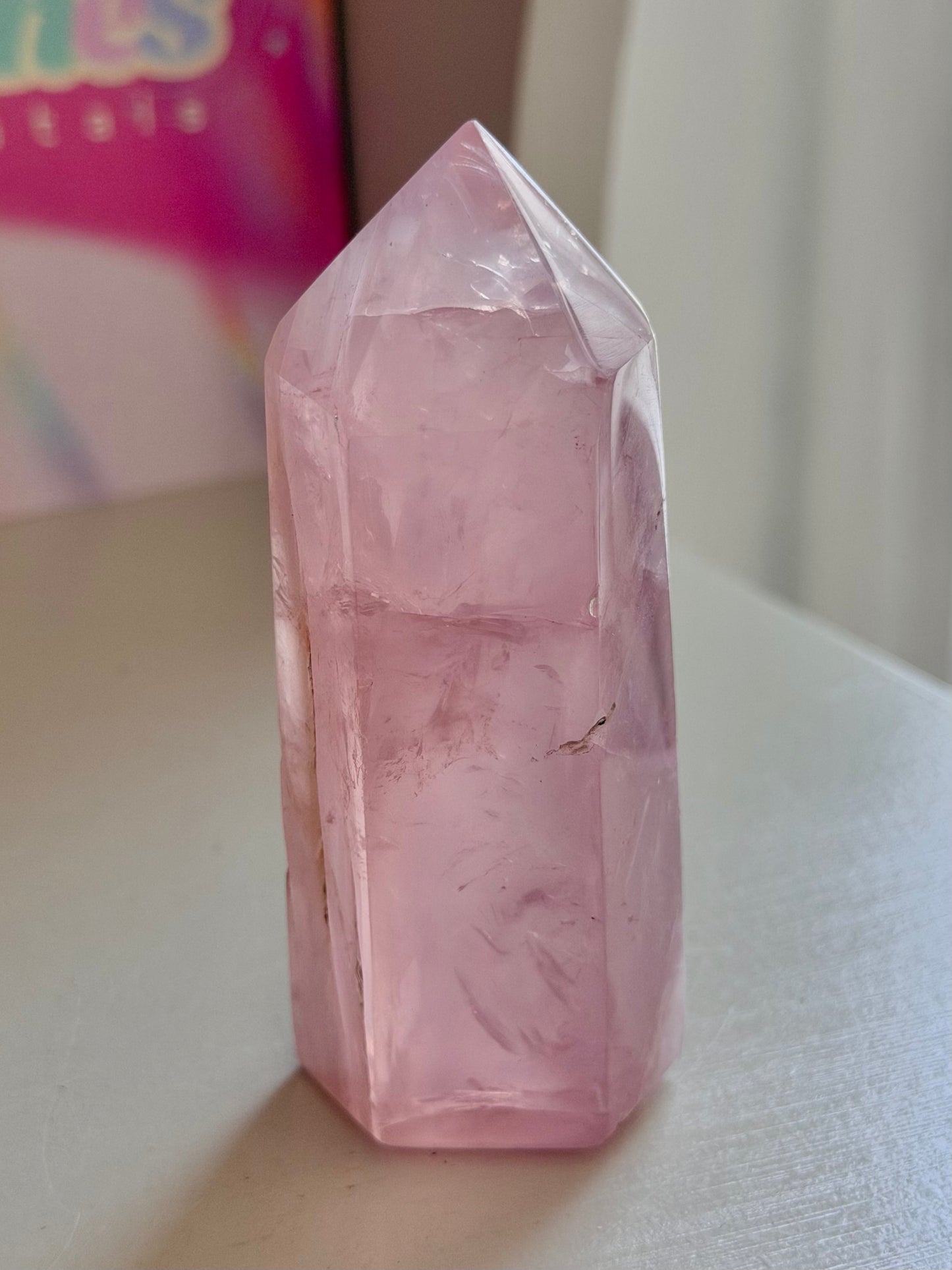 Gemmy purple-toned rose quartz tower