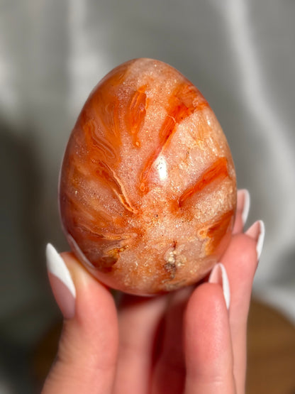 Quartzy “tie-dye” carnelian egg