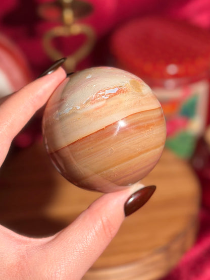 Warm toned polychrome jasper sphere