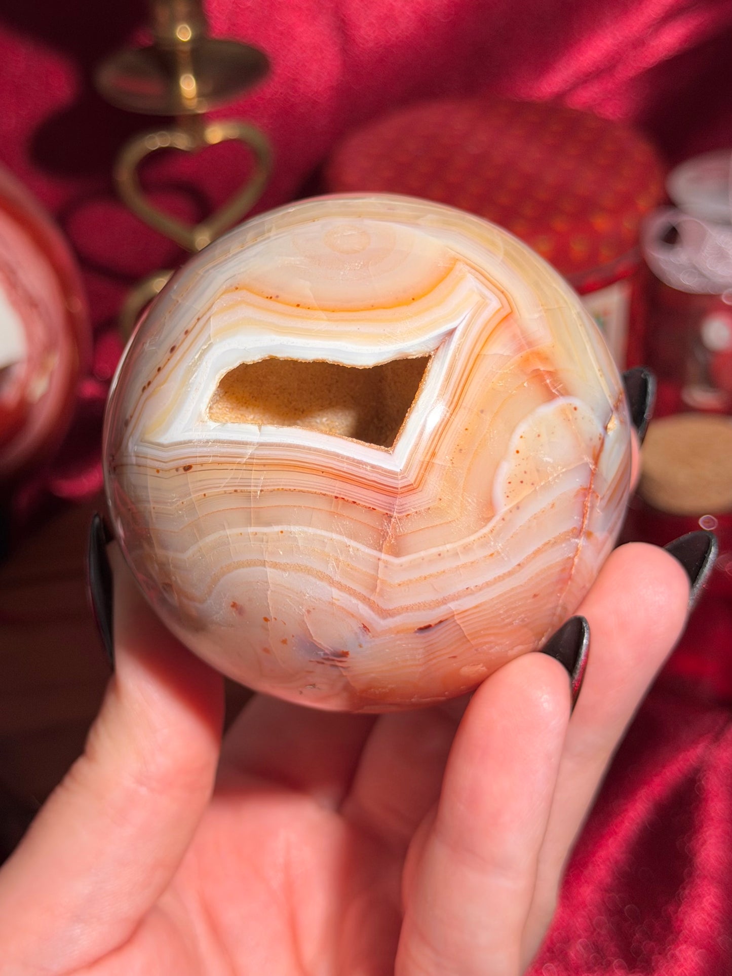 Pastel yellow and peachy toned carnelian sphere with large druzy cave 72mm
