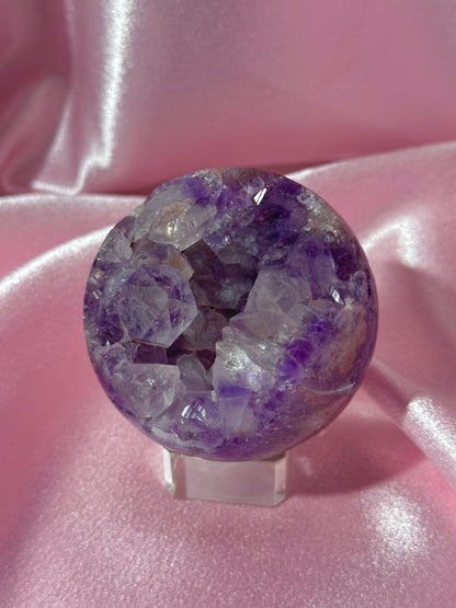 Grape jelly purple Brazilian pink amethyst sphere with unique quartz caves