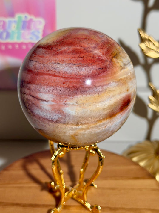 Warm toned red and yellow sea jasper sphere