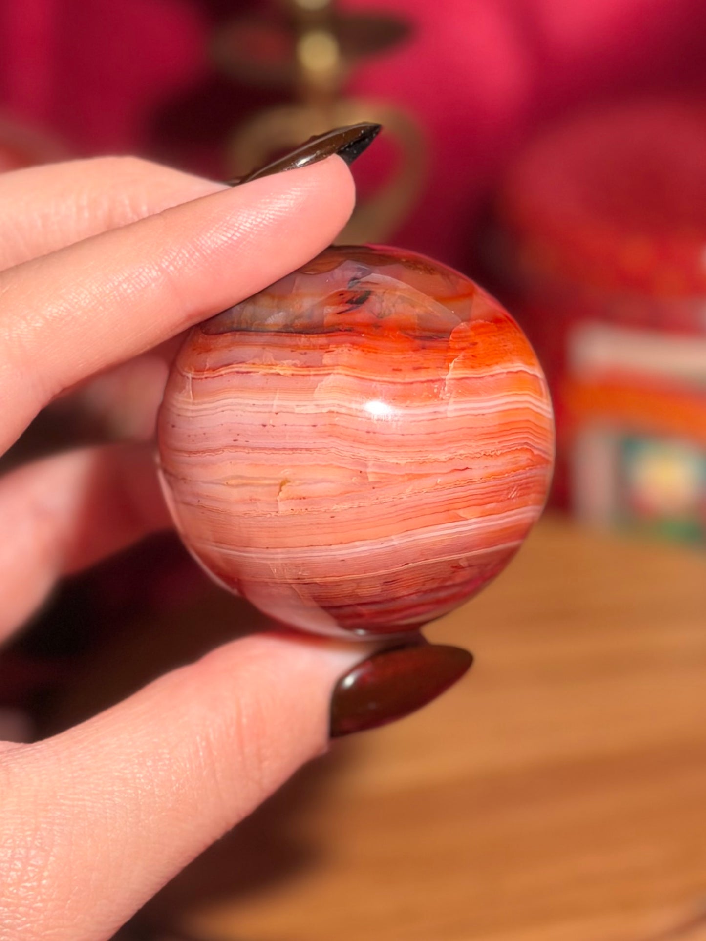 Pink banded carnelian sphere