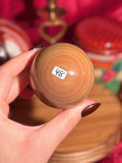 Warm toned polychrome jasper sphere