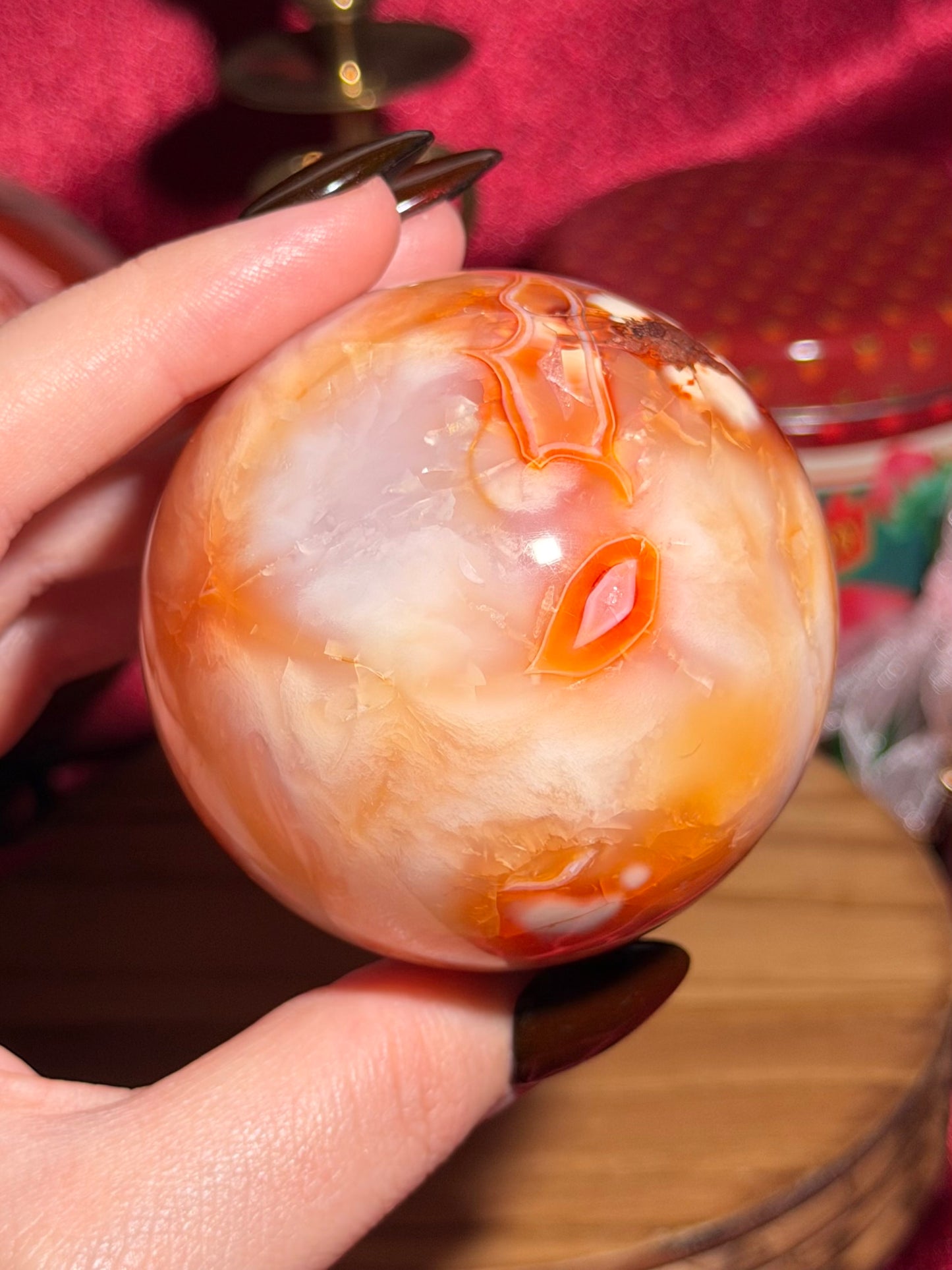 Glowy yellow carnelian sphere with imperfect fill spots