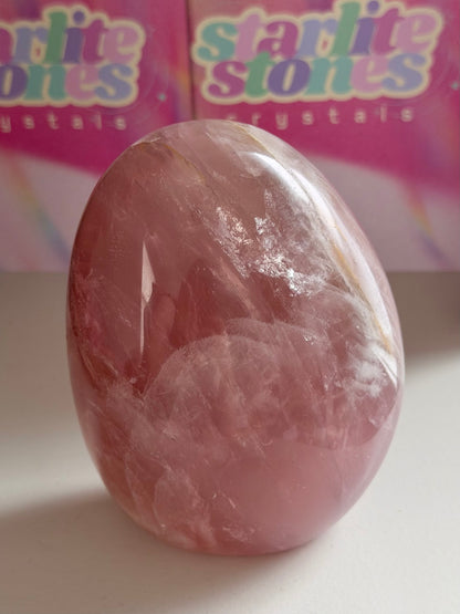 Glassy “guava” pink rose quartz freeform