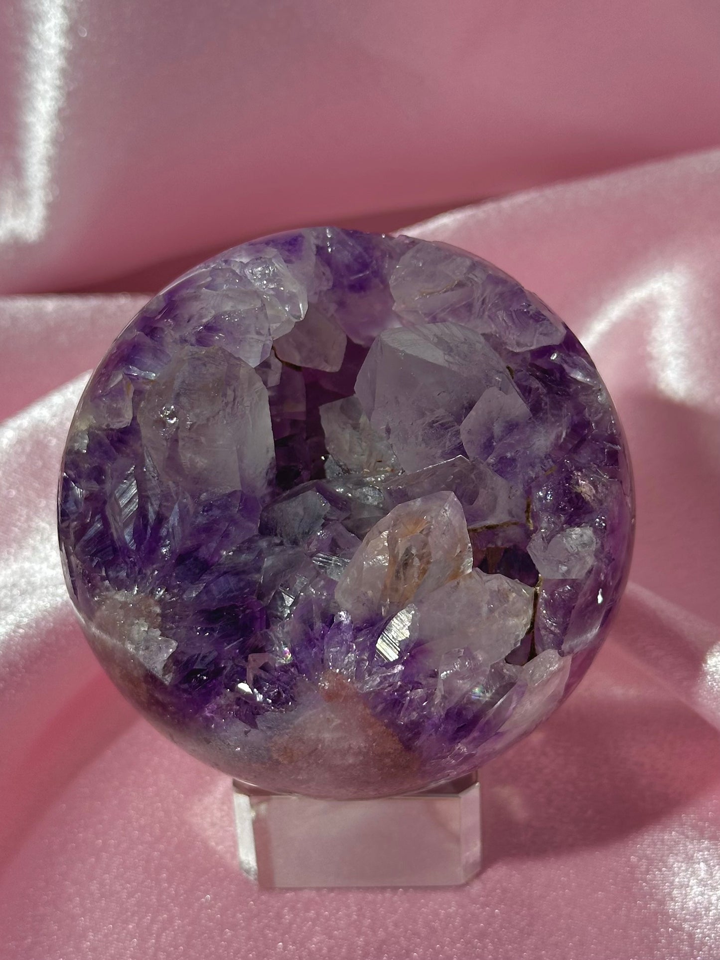 Grape jelly purple Brazilian pink amethyst sphere with unique quartz caves