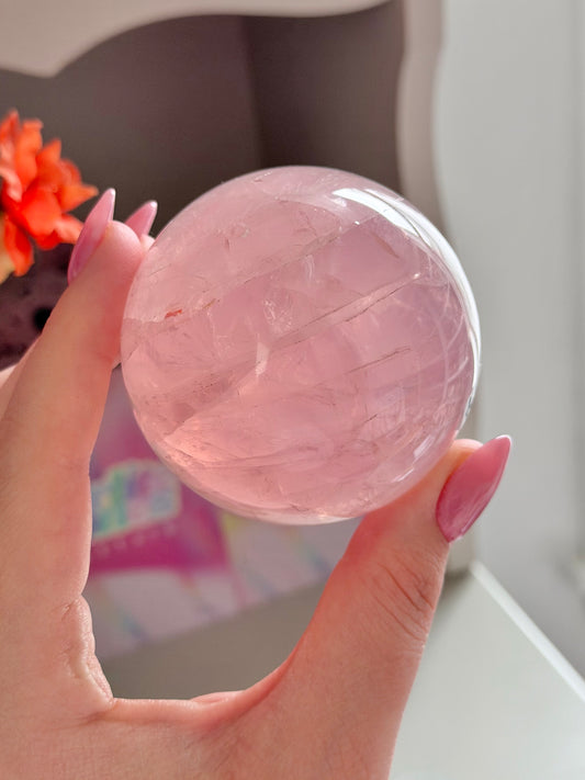 Pink gemmy star rose quartz sphere