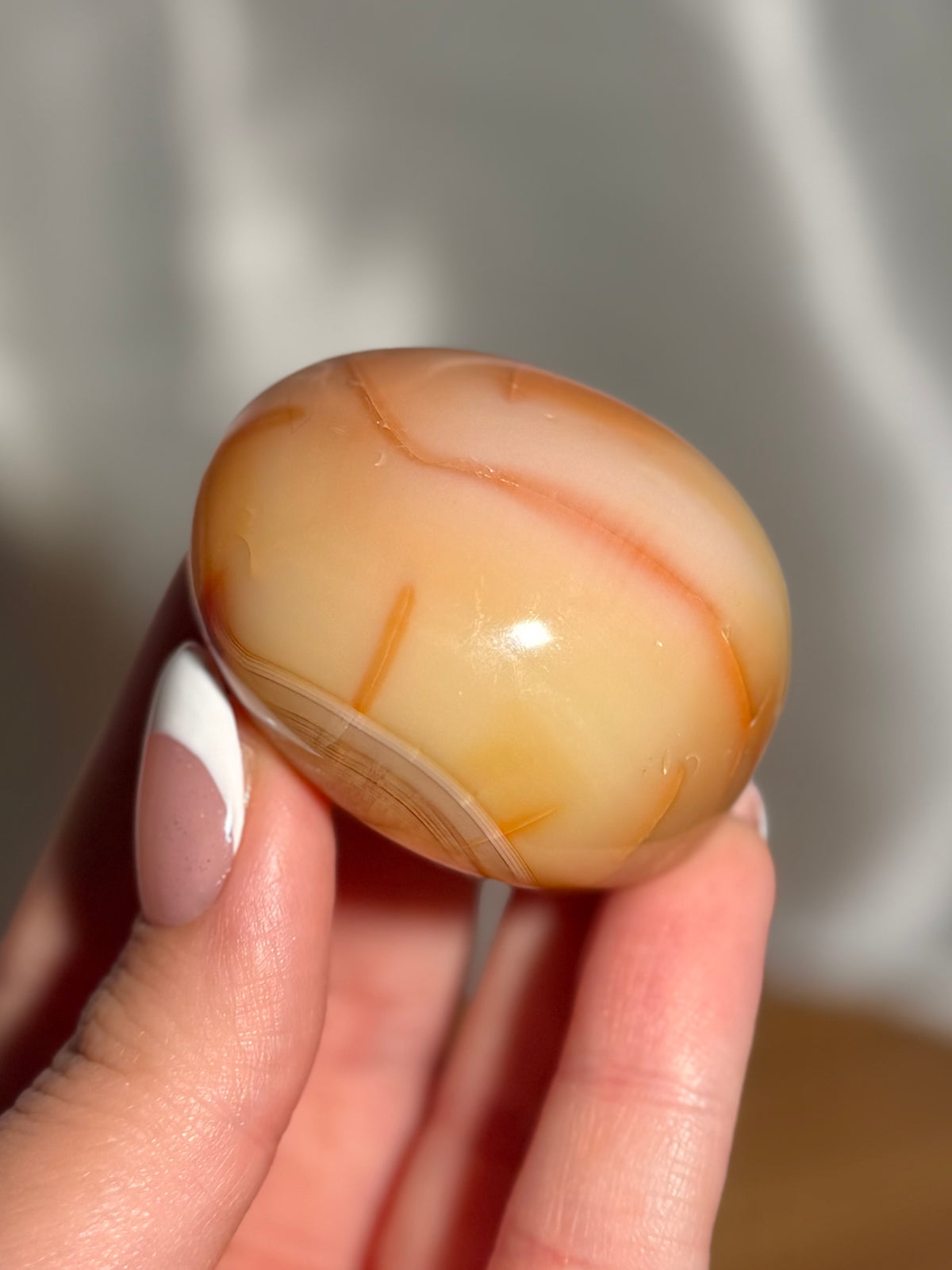 Creamy yellow carnelian palmstone