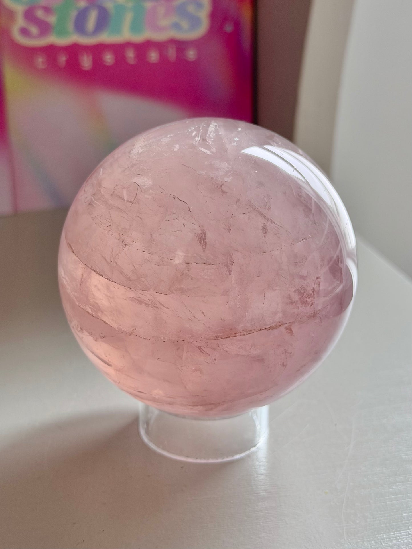 Pink gemmy star rose quartz sphere