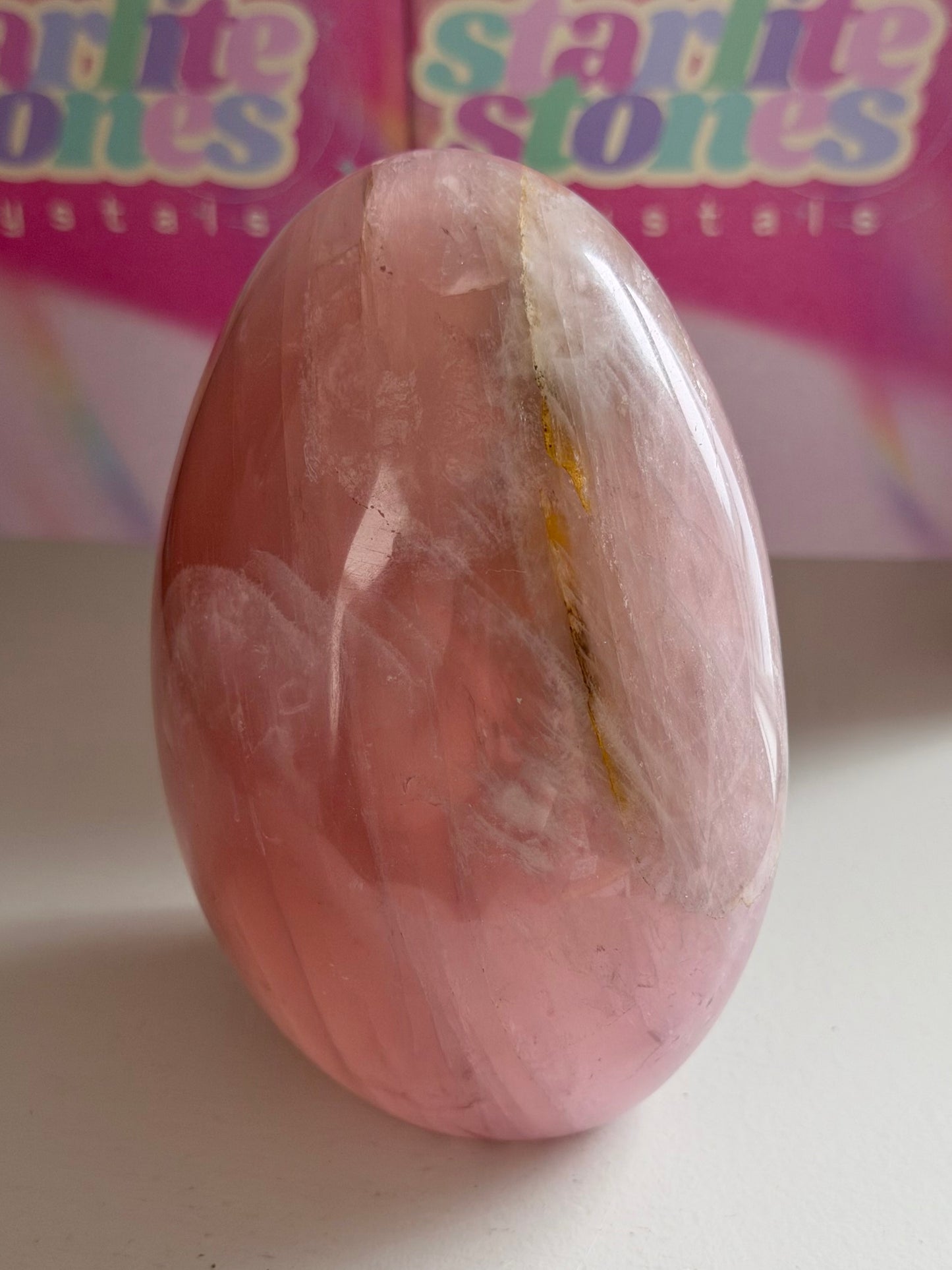 Glassy “guava” pink rose quartz freeform