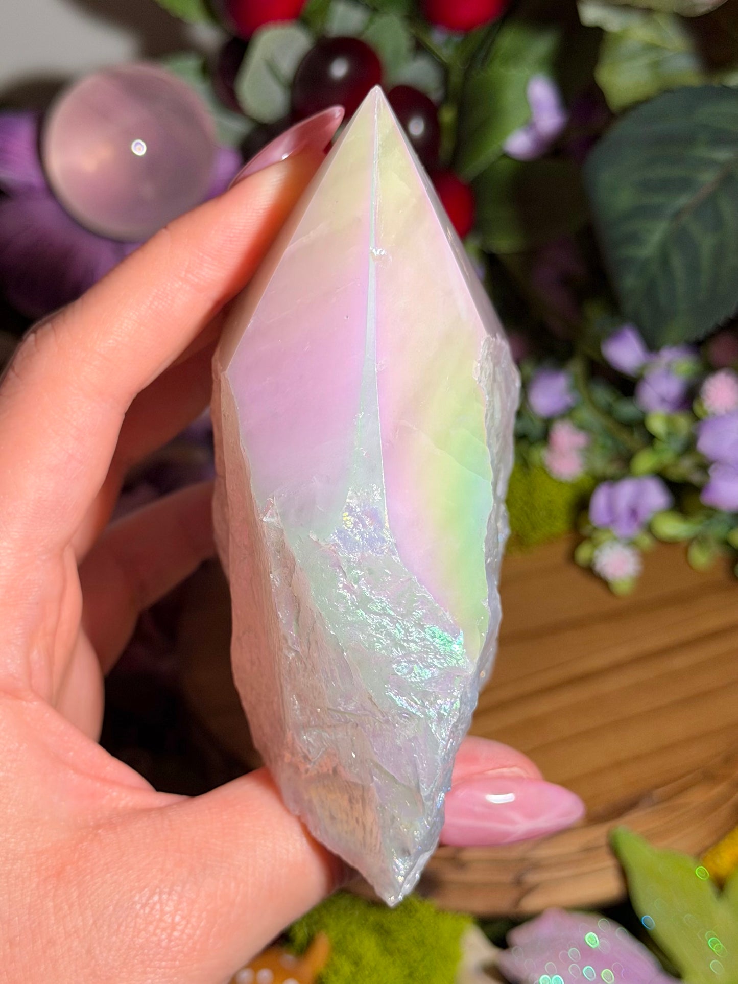 Aura coated rose quartz half polished point from Brazil