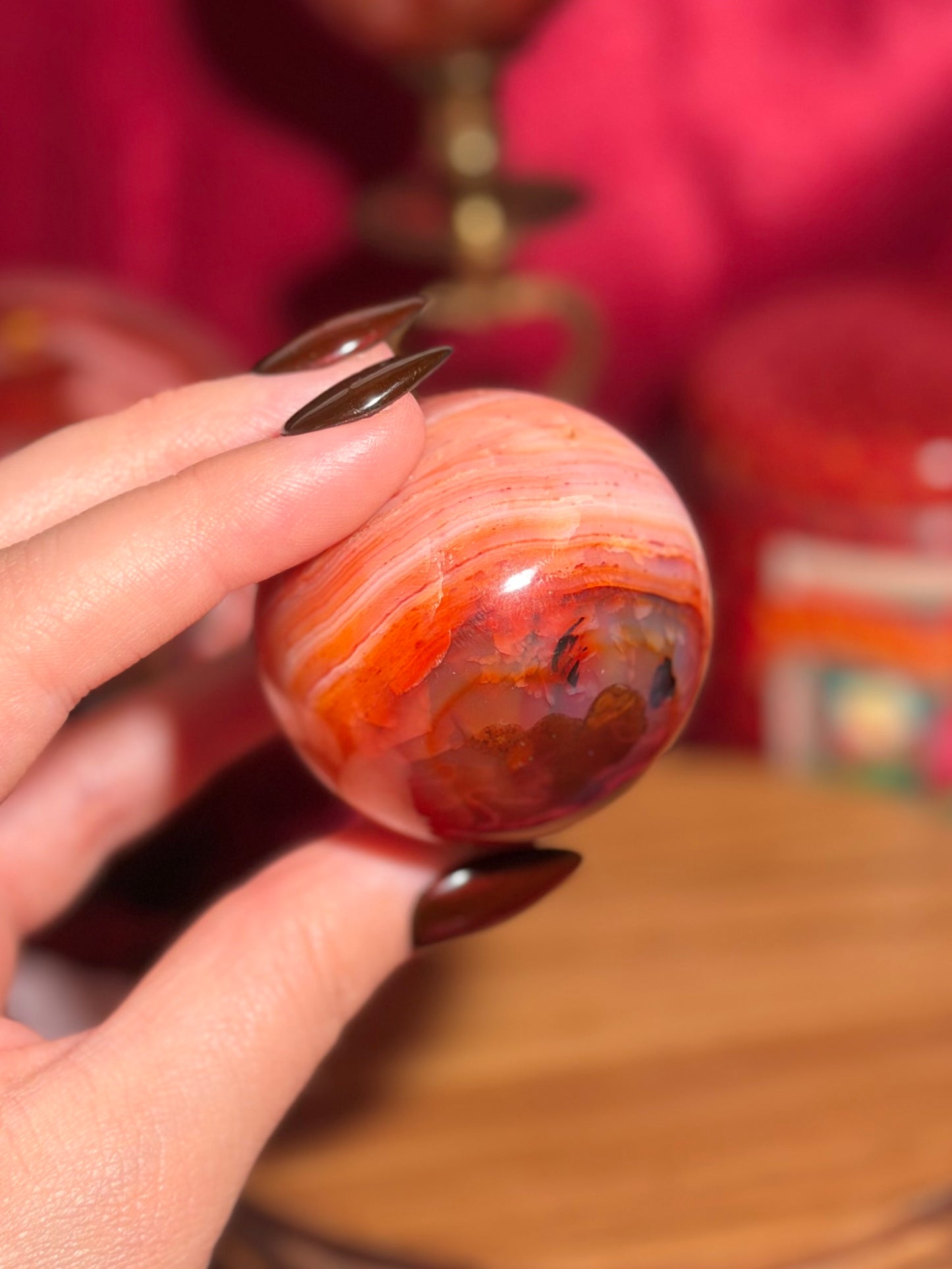 Pink banded carnelian sphere