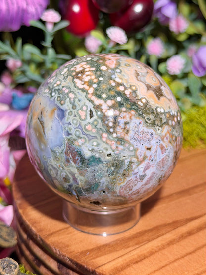 Green and pink 8th Vein Ocean Jasper sphere