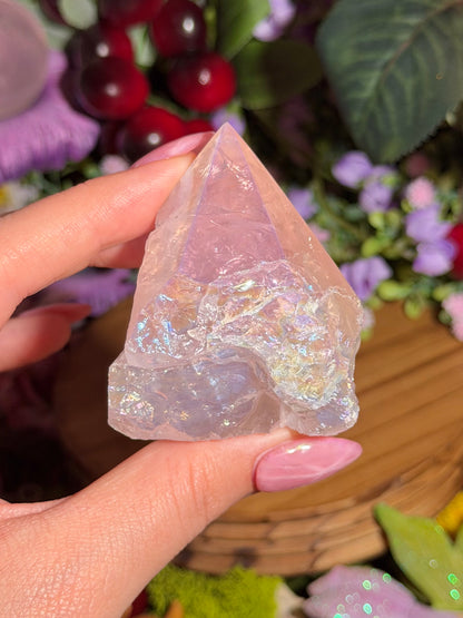 Aura coated rose quartz half polished point from Brazil