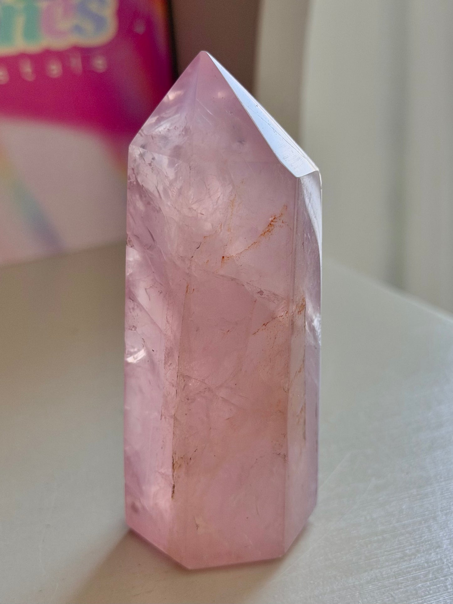 Gemmy purple-toned rose quartz tower