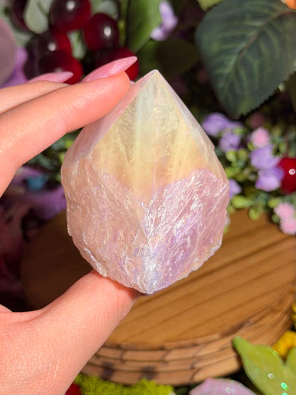Aura coated rose quartz half polished point from Brazil