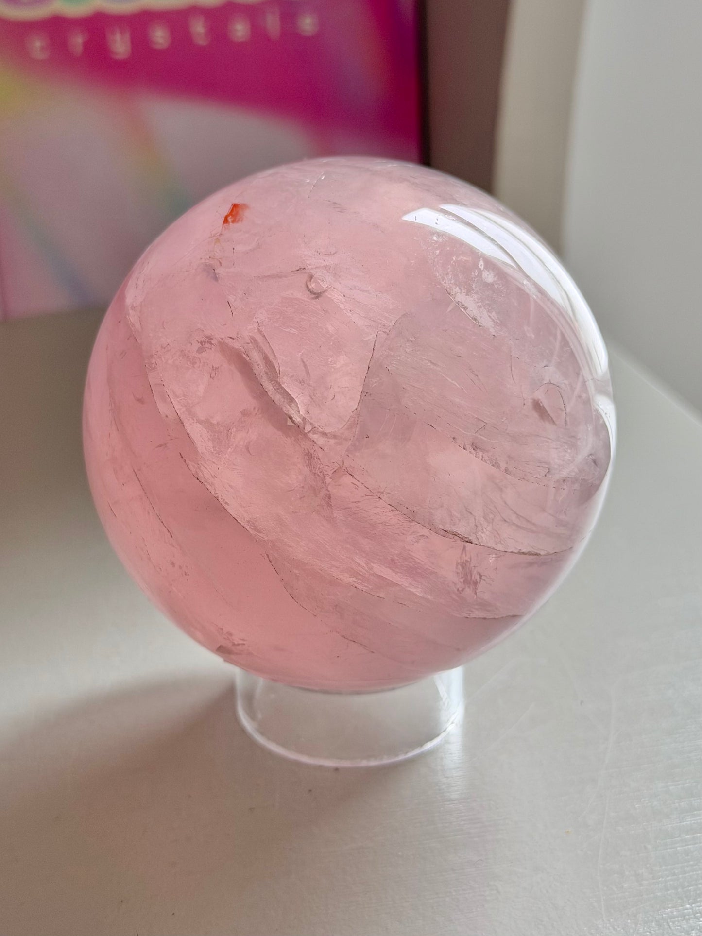 Pink gemmy star rose quartz sphere
