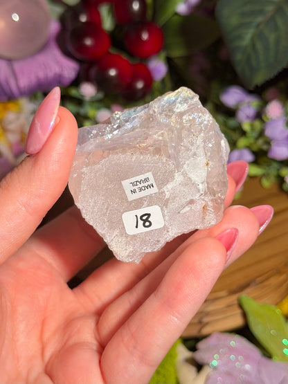 Aura coated rose quartz half polished point from Brazil