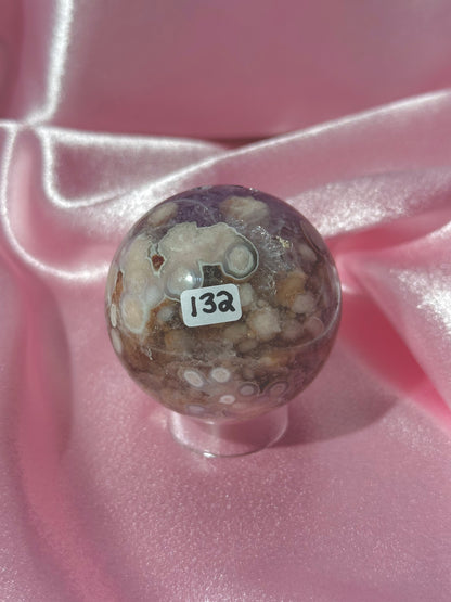 Purple Brazilian pink amethyst x flower agate sphere with druzy cave