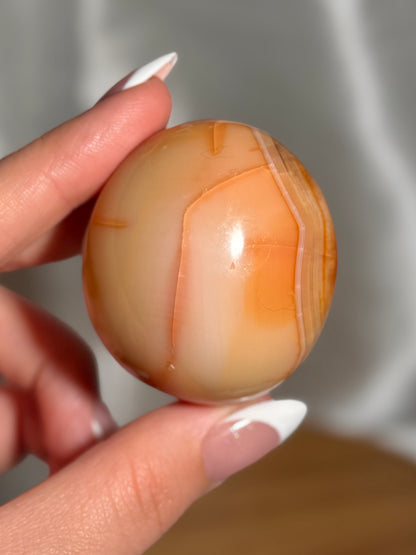 Creamy yellow carnelian palmstone